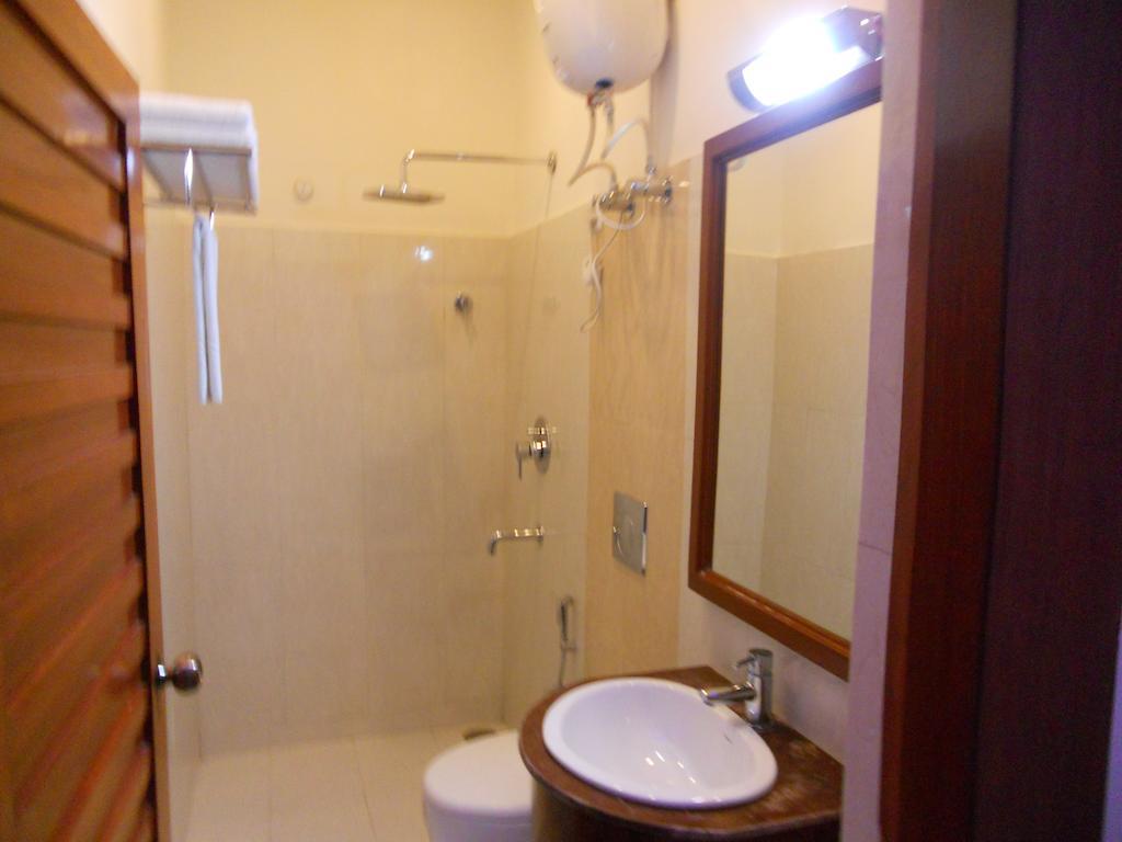 Hotel Prayag Aristro Club Kalkata Pokoj fotografie