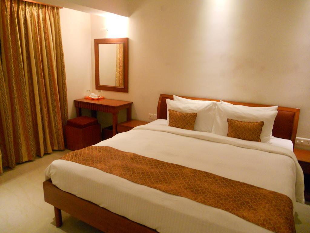 Hotel Prayag Aristro Club Kalkata Pokoj fotografie